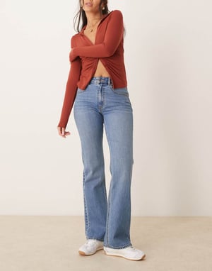Gina Tricot mid rise bootcut stretch jeans in mid wash blue