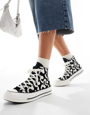 Converse Chuck 70 Hi trainers in black and white cow print