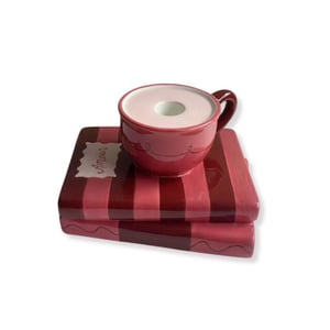 House Vitamin Candle holder cup on pile of books red/pink dolomite 16,5x13,5x9,5cm