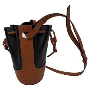 Loewe Small Balloon Bucket Bag in zwart en bruin leer
