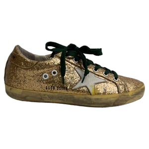 Golden Goose Super Star Låga Sneakers i Metallic Guldglitter