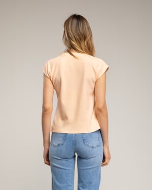Mouwloze effen gebreide top met een ronde hals.