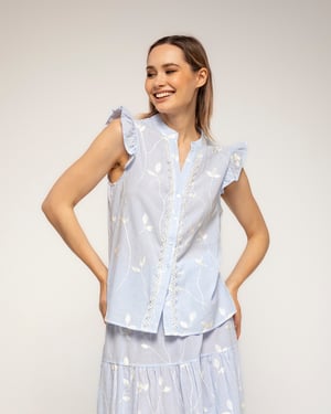 Gestreepte blouse met borduursels en kantdetail met ruches aan de mouwen