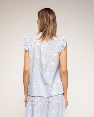 Gestreepte blouse met borduursels en kantdetail met ruches aan de mouwen