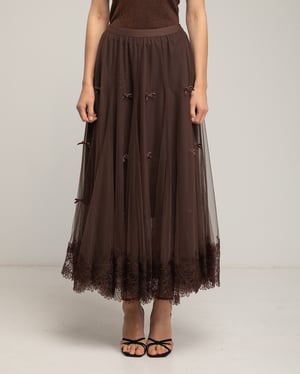 Tule midi-rok met kant aan de onderkant en strikdetails.