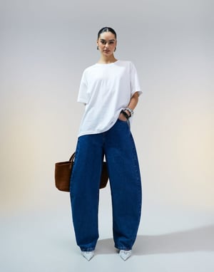 ASOS DESIGN high waisted barrel leg jeans in mid blue