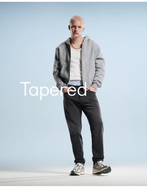 ASOS DESIGN tapered jeans in black wash
