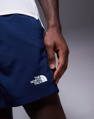 The North Face 24/7 5\ logo shorts in navy"