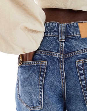 ASOS DESIGN denim relaxed short in midwash blue