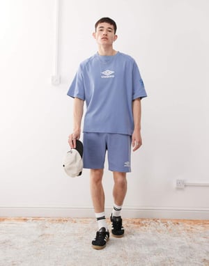 Umbro Drill embroidered logo shorts in blue