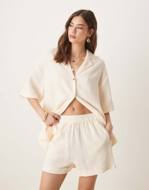 ASOS DESIGN cheesecloth pull on shorts with raw edge detail co-ord in buttermilk
