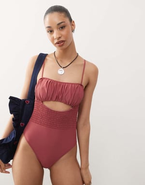 Reclaimed Vintage swimsuit with shirred waist and cut out detail in pink