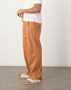 ASOS DESIGN smart wide leg linen blend trousers with double pleats in rust