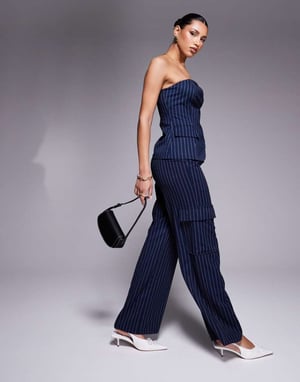 In The Style x Natalya Wright exclusive tailored wide leg pocket detail trousers co-ord in navy pinstripe