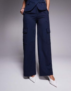 In The Style x Natalya Wright exclusive tailored wide leg pocket detail trousers co-ord in navy pinstripe