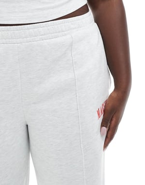 ASOS DESIGN Curve straight leg jogger with Marseille embroidered graphic in ice marl