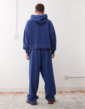 COLLUSION baggy relaxed jogger in washed navy