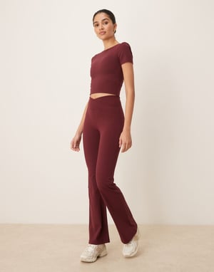 TALA DayFlex wrap high waisted flared yoga pant in burgundy