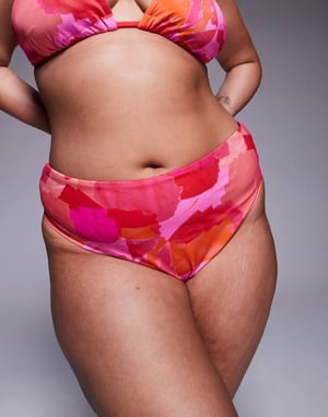 ASOS DESIGN Curve Exclusive Arina high leg high waist in pink & red abstract print