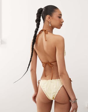Reclaimed Vintage tie front triangle bikini top with frills in butter yellow and brown