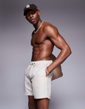 ASOS DESIGN swim shorts in mid length in light stone
