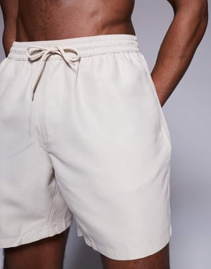 ASOS DESIGN swim shorts in mid length in light stone