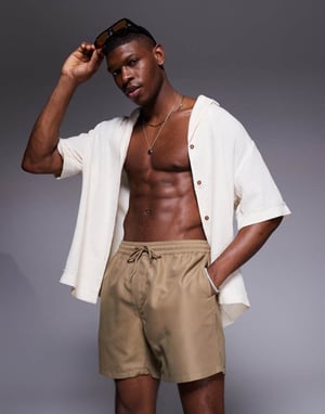 ASOS DESIGN swim shorts in mid length in dark stone