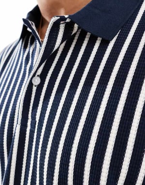 ASOS DESIGN oversized polo i svart och vit randig