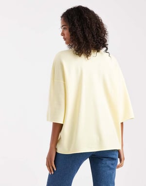 ASOS DESIGN stickad strukturerad t-shirt i buttermilk
