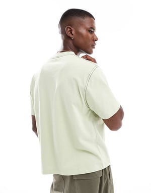 ASOS DESIGN tyngd boxig oversized t-shirt med textbroderi i tvättad grön