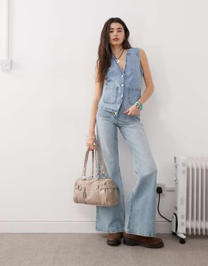 Återvunnet vintage denim västar set från 70-talet med fickor i blåtvätt