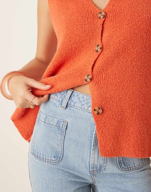 ASOS DESIGN slub knit relaxed fit waistcoat in orange