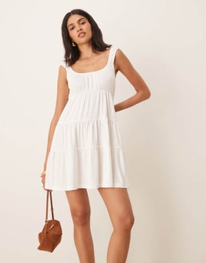 ASOS DESIGN babydoll svängande lager mini klänning i elfenben