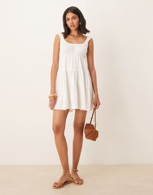 ASOS DESIGN babydoll svängande lager mini klänning i elfenben