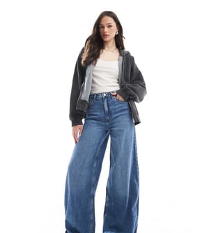 ASOS DESIGN Lång mjuk palazzo-jeans i medtvättad blå