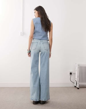 Återvunnen vintage denim 70-tals palazzojeans med fickor och knappstängning i blå tvätt