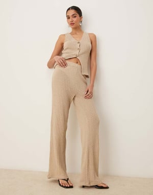 ASOS DESIGN samordnad halvgenomskinlig stickad byxa med vida ben i sten