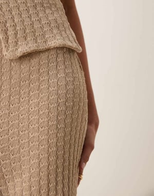 ASOS DESIGN samordnad halvgenomskinlig stickad byxa med vida ben i sten