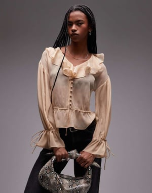 Topshop genomskinlig volang knytblus i beige