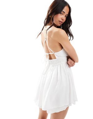 Hollister spaghetti strap cross back babydoll romper in white polka dot