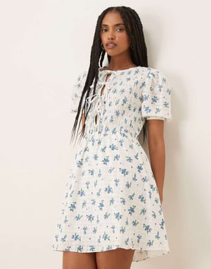 Glamorous bow detail puff sleeve dress in blue floral