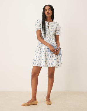 Glamorous bow detail puff sleeve dress in blue floral