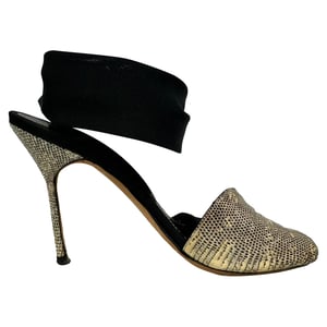 Manolo Blahnik ormskalad snörningssandaler i djurmönstrad läder