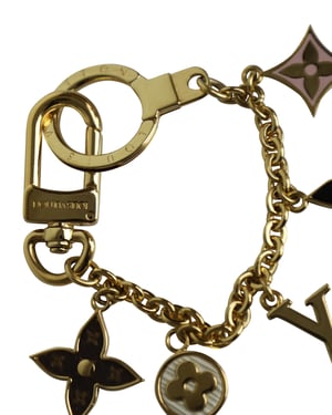 Louis Vuitton Fleur de Monogram Bag Charm in Gold Metal