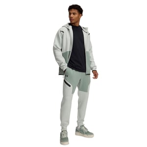 Under Armour Joggingbyxor för män i Unstoppable-fleece med dragkedja och fickor (Grön/Svart)