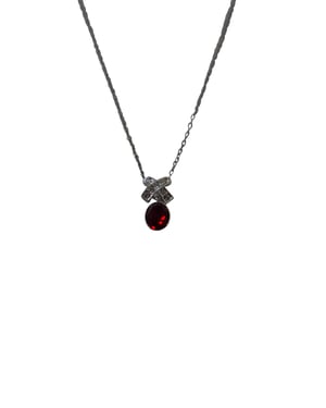 Swarovski oorbellen en halsketting sieradenset met rode kristallen.