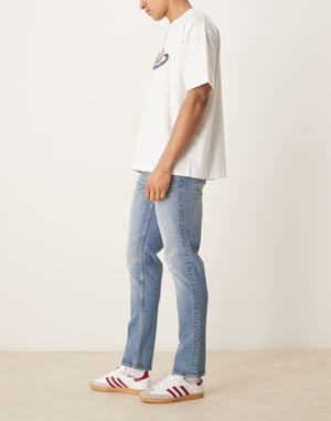 ASOS DESIGN slim fit jeans in vintage mid wash blue