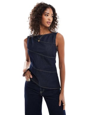 ASOS DESIGN asymmetrisk denimtopp med exponerade sömmar i indigo