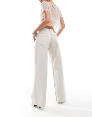 Motel roomy wide leg low rise jeans in off-white