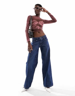 Motel extra wide low rise jeans in mid blue used wash